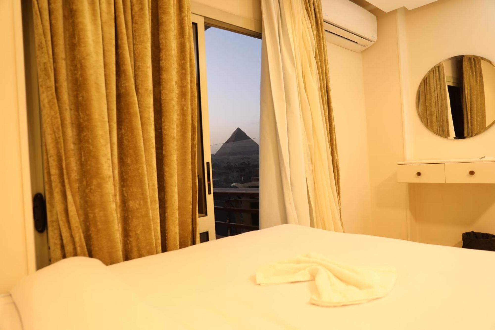 Pyramids Heart Hotel Kafrat al Jabal Екстер'єр фото