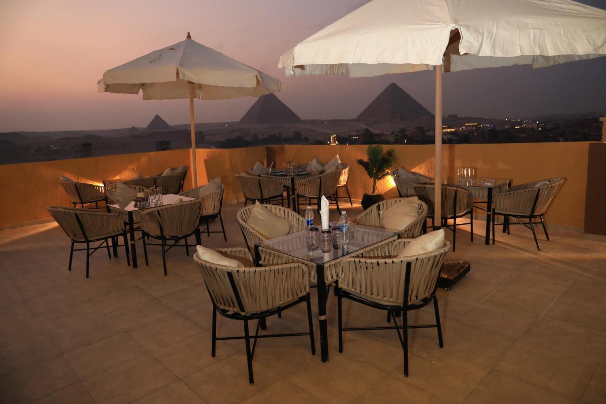 Pyramids Heart Hotel Kafrat al Jabal Екстер'єр фото