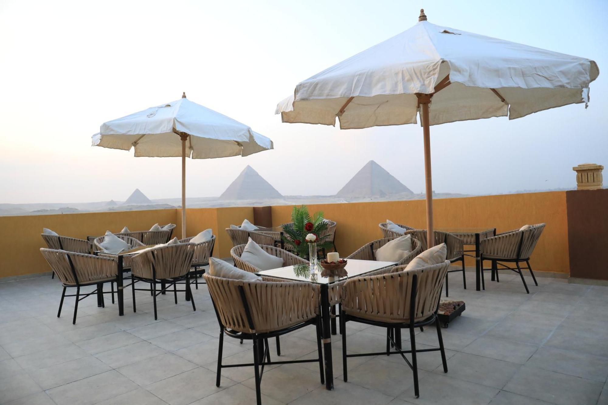 Pyramids Heart Hotel Kafrat al Jabal Екстер'єр фото
